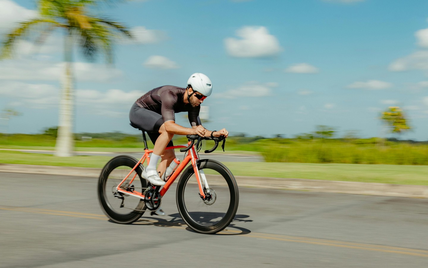 Dynamic Bicycle Racing Under Clear Blue Skies