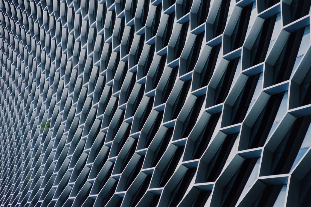 Minimalist honeycomb facade — desktop and phone wallpaper, free download