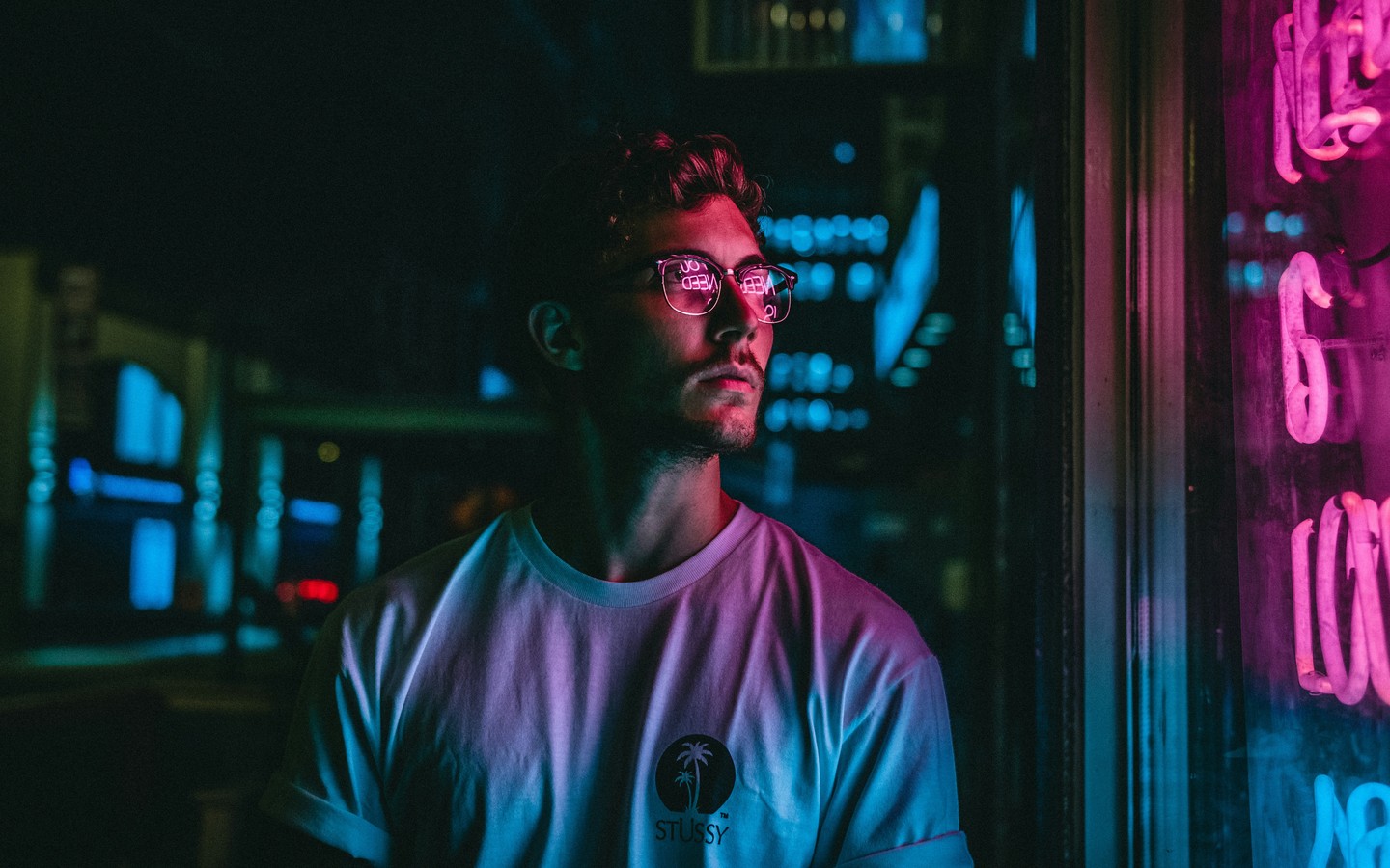 A Nighttime Portrait with Neon Reflections