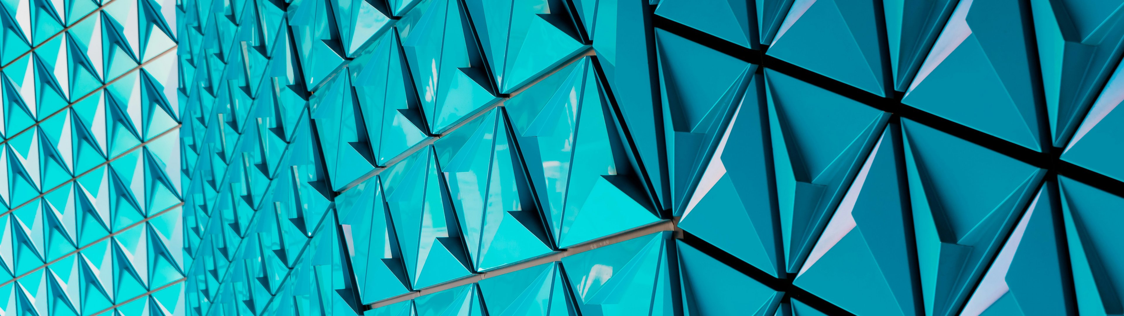 Modern facade with triangular panels - UltraWide 32:9 wallpapers in 3840x1080 resolution