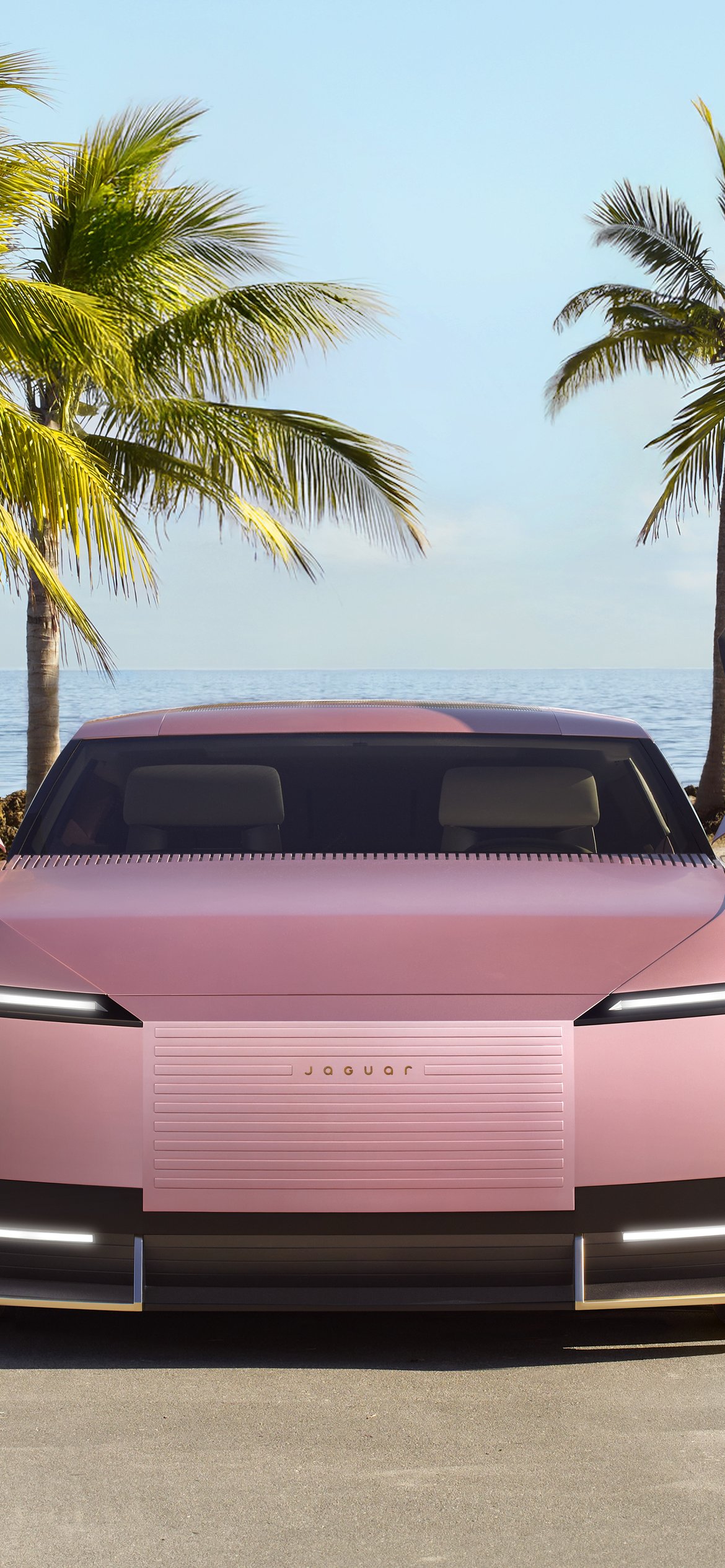 Jaguar Type 00 in Miami - Wallpapers for iPhone 12 Pro/13 Pro/14 in 1170x2532 resolution