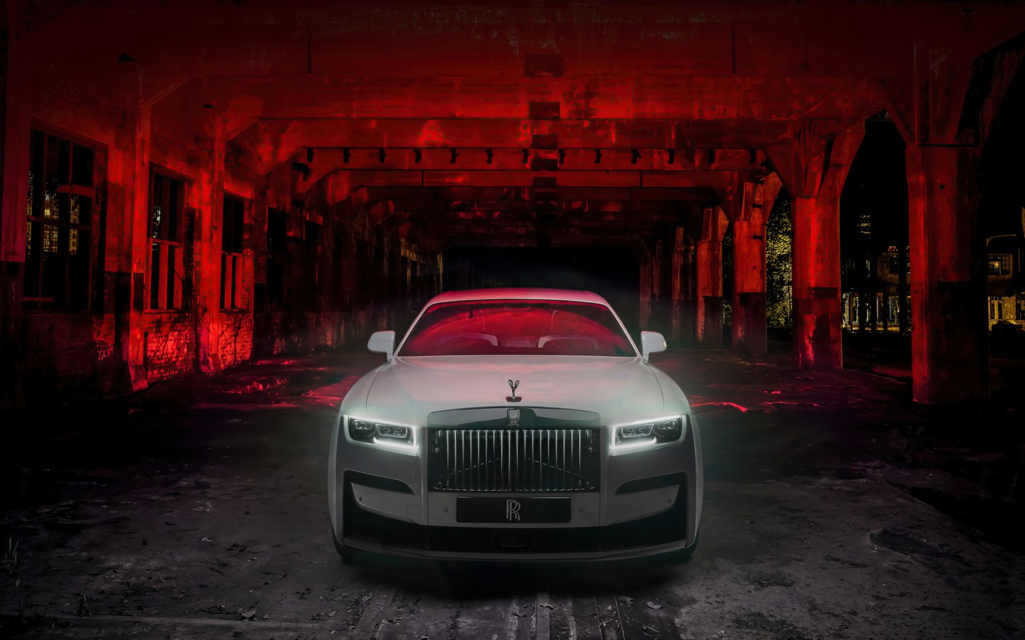 Elegant Rolls Royce in a Dramatic Warehouse Setting