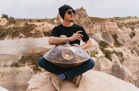 tools Wallpapers for Samsung/Xiaomi (2000x2000): musician, handpan, rock, man
