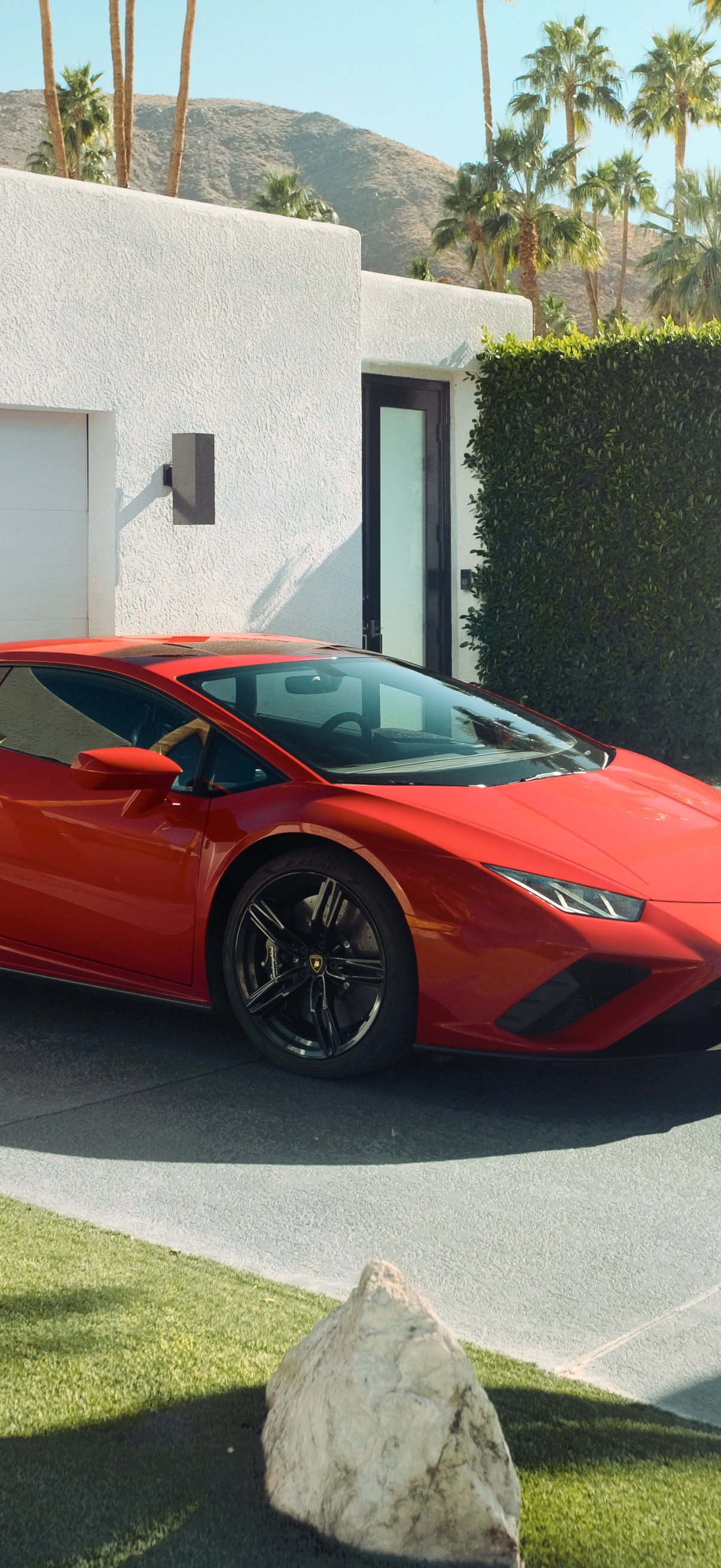 Red Lamborghini Huracán EVO on the side - Wallpapers for iPhone 17 Pro/17/16 Pro in 1206x2622 resolution