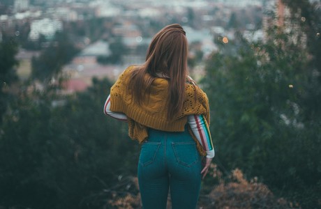 A Woman Admiring the City View from Above