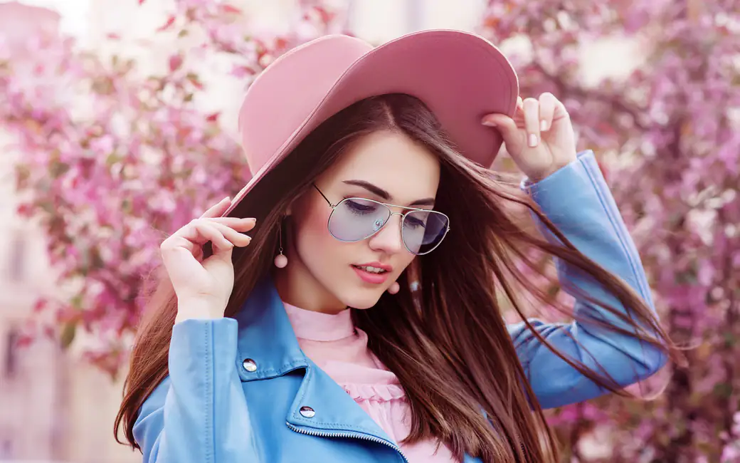 Woman in blue jacket and pink hat — desktop and phone wallpaper, free download