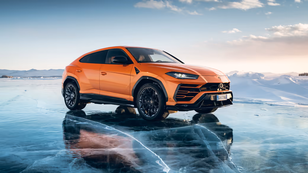 Orange Lamborghini Urus - Wallpapers for Apple MacBook 12″ in 2304x1440 resolution