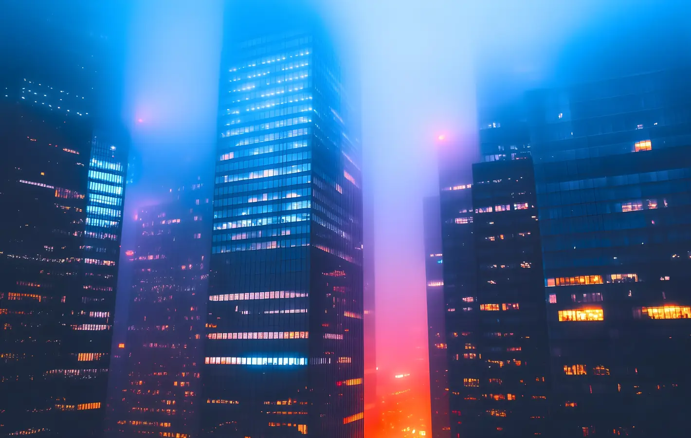 Downtown skyscrapers in the fog — desktop and phone wallpaper, free download