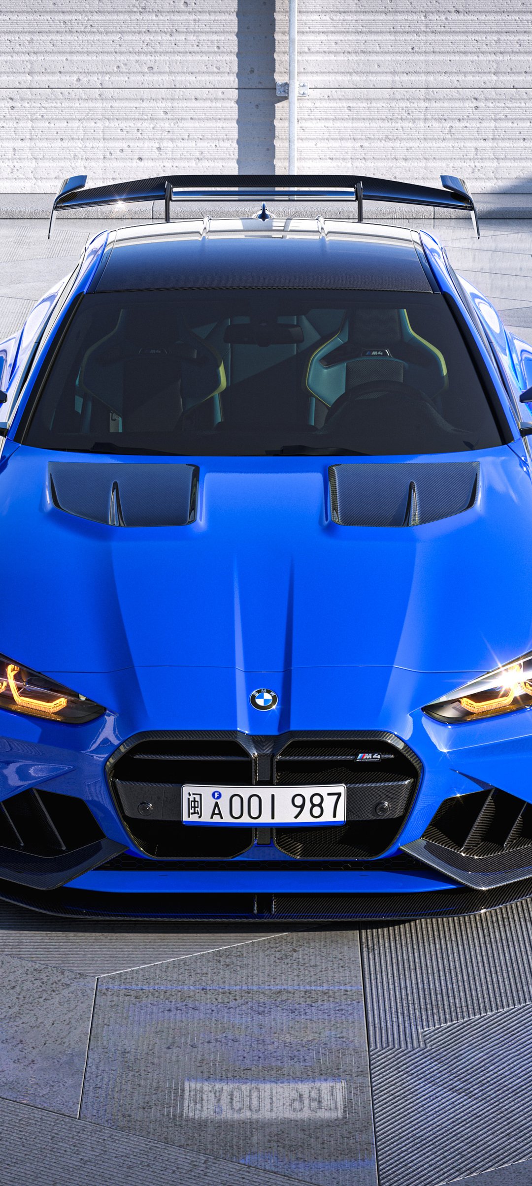 Blue BMW M4 G82 front view in  - Wallpapers for Samsung Galaxy A13/A14/A53, Realme 12 Pro 5G, POCO M5 in 1080x2408 resolution