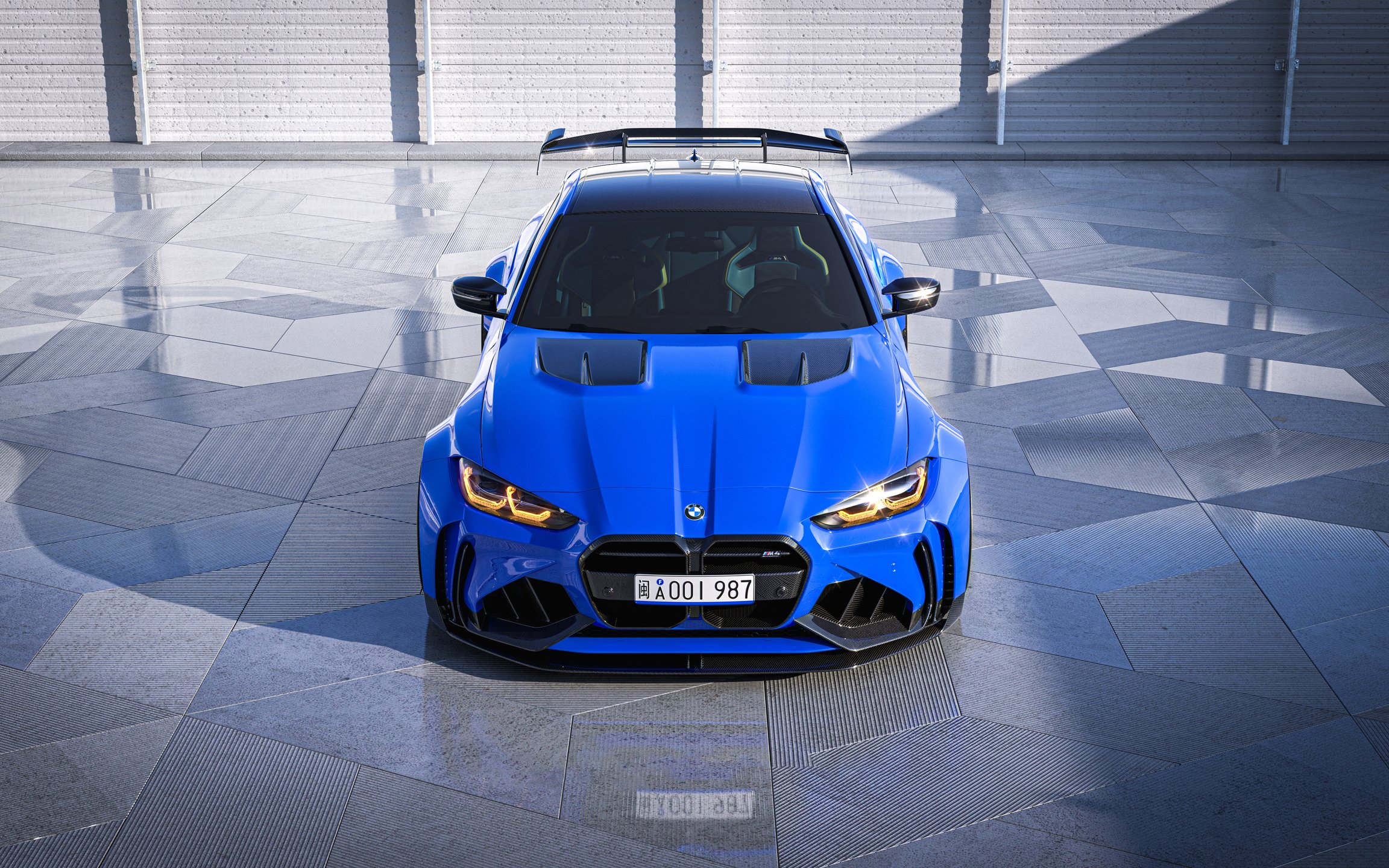 Blue BMW M4 G82 front view in  - Wallpapers for Apple MacBook 12″ in 2304x1440 resolution