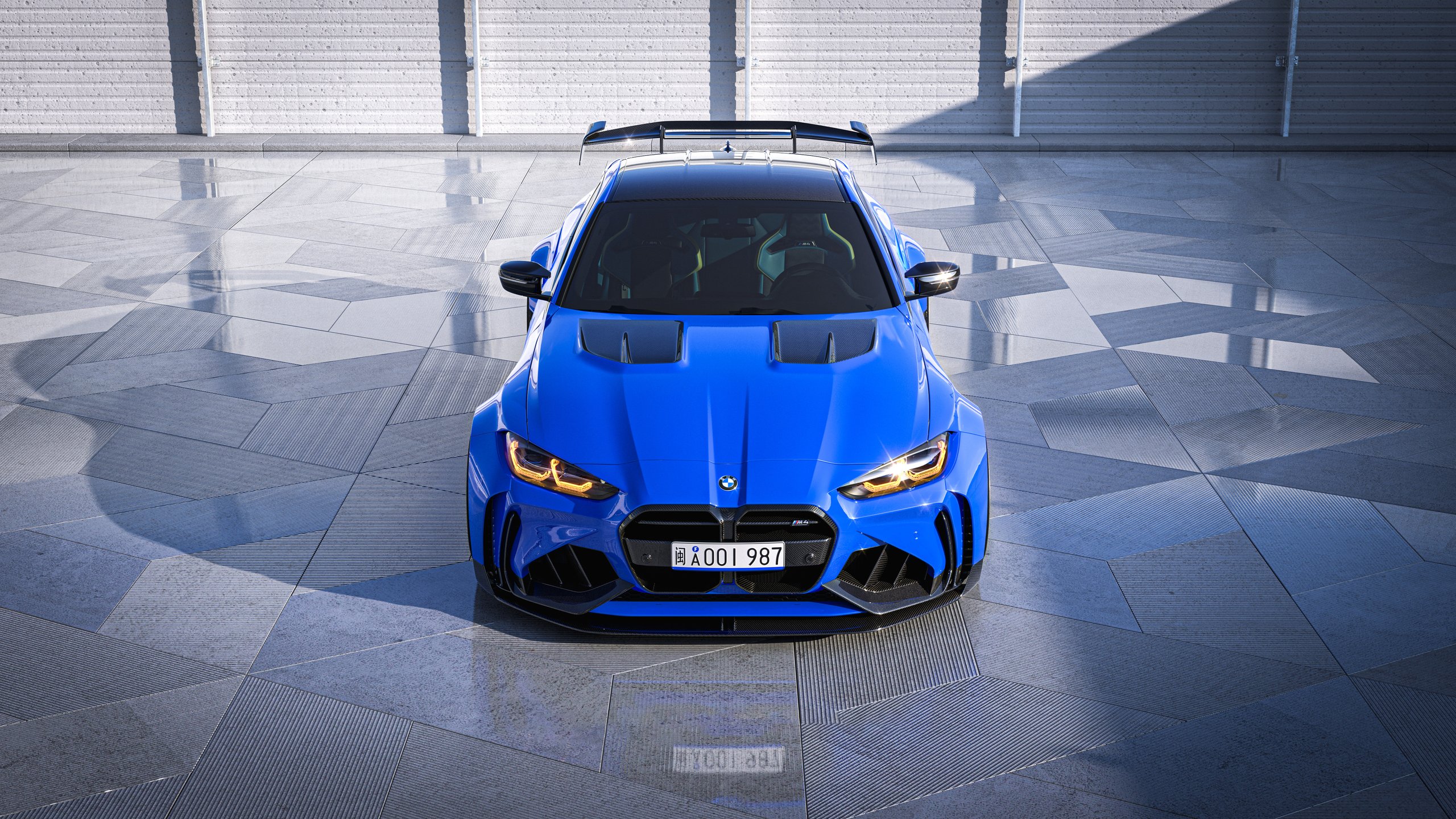 Blue BMW M4 G82 front view in  - 2K Quad HD wallpapers in 2560x1440 resolution