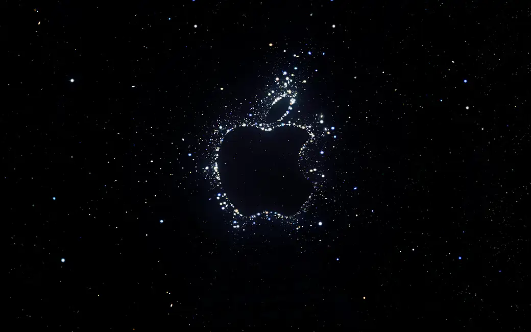 Apple logo formed by stars in space — desktop and phone wallpaper, free download