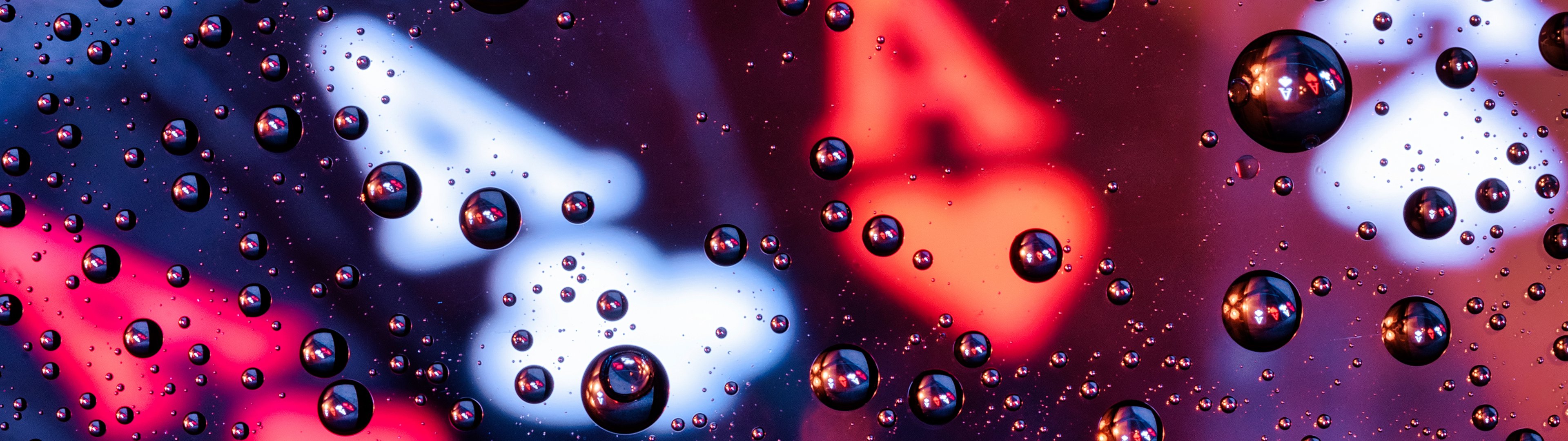 Water droplets on a blurred background - UltraWide 32:9 wallpapers in 3840x1080 resolution
