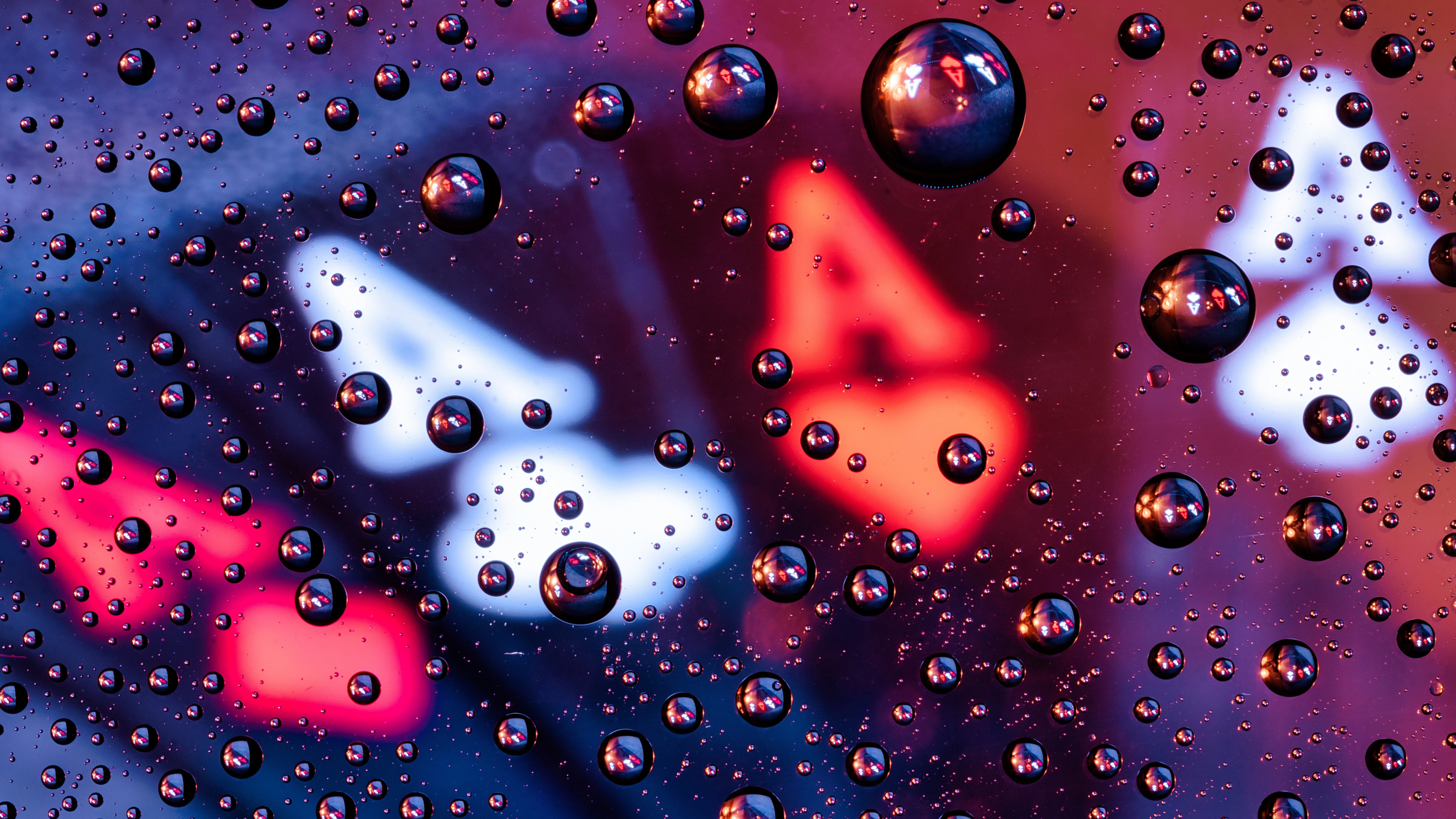Water droplets on a blurred background - 5K wallpapers in 5120x2880 resolution