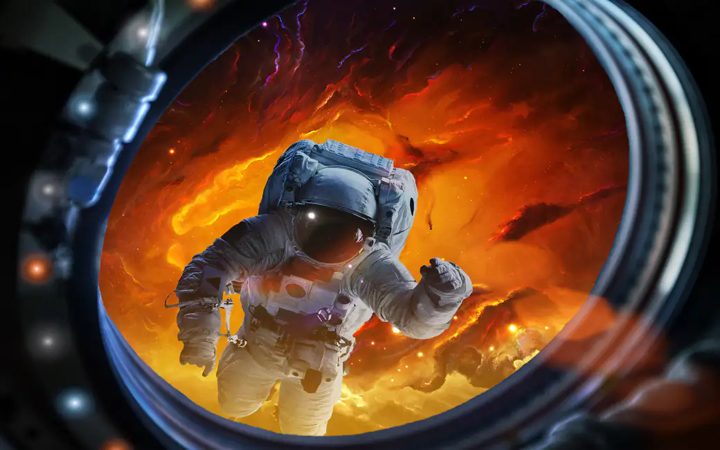 An astronaut on the red nebula — desktop and phone wallpaper, free download
