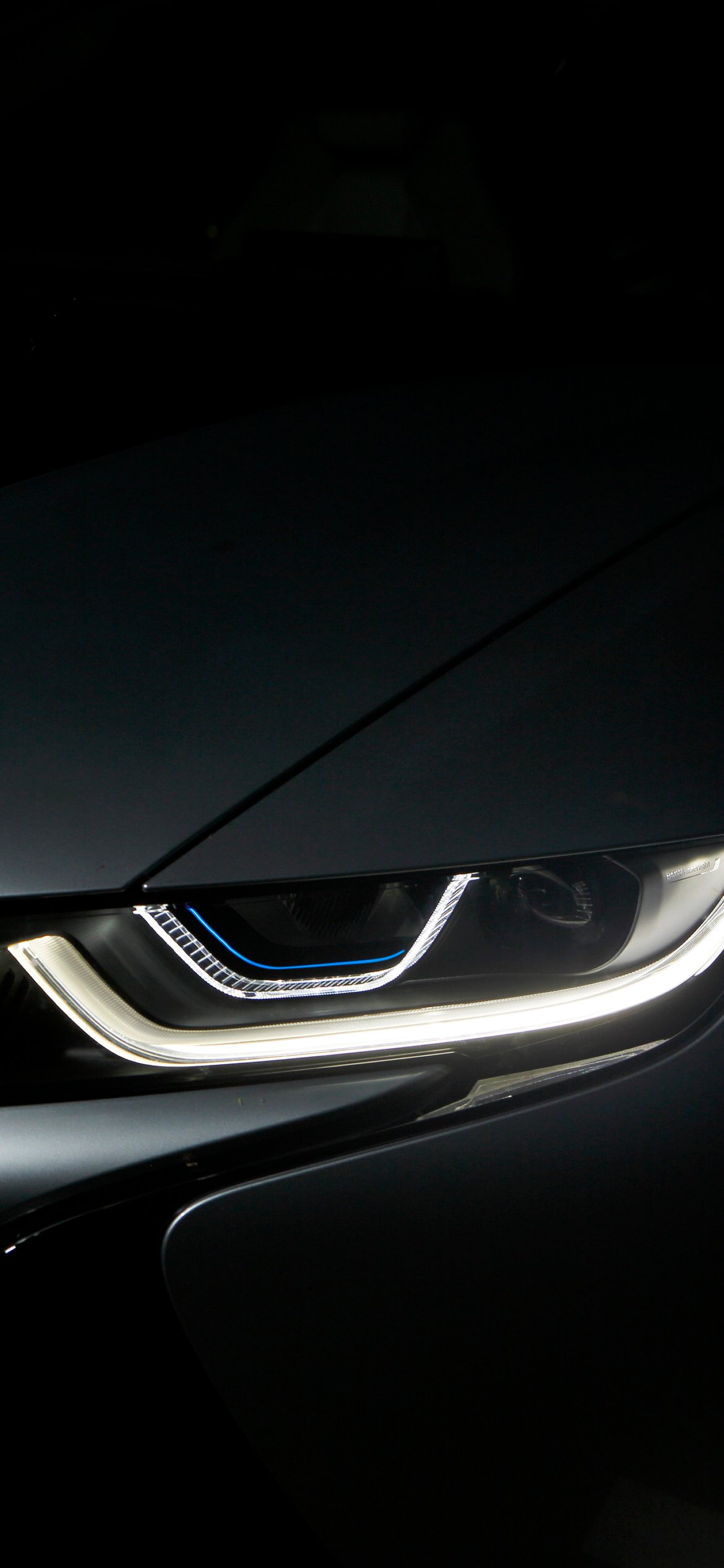 BMW i8 with LED headlights - Wallpapers for iPhone 12 Pro/13 Pro/14 in 1170x2532 resolution