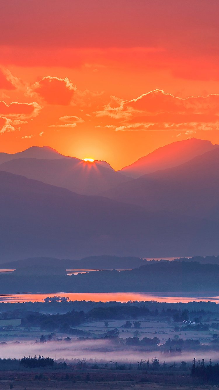 Bright orange sunrise over the valley - Wallpapers for iPhone 6/6S/7/8/SE2/SE3 in 750x1334 resolution
