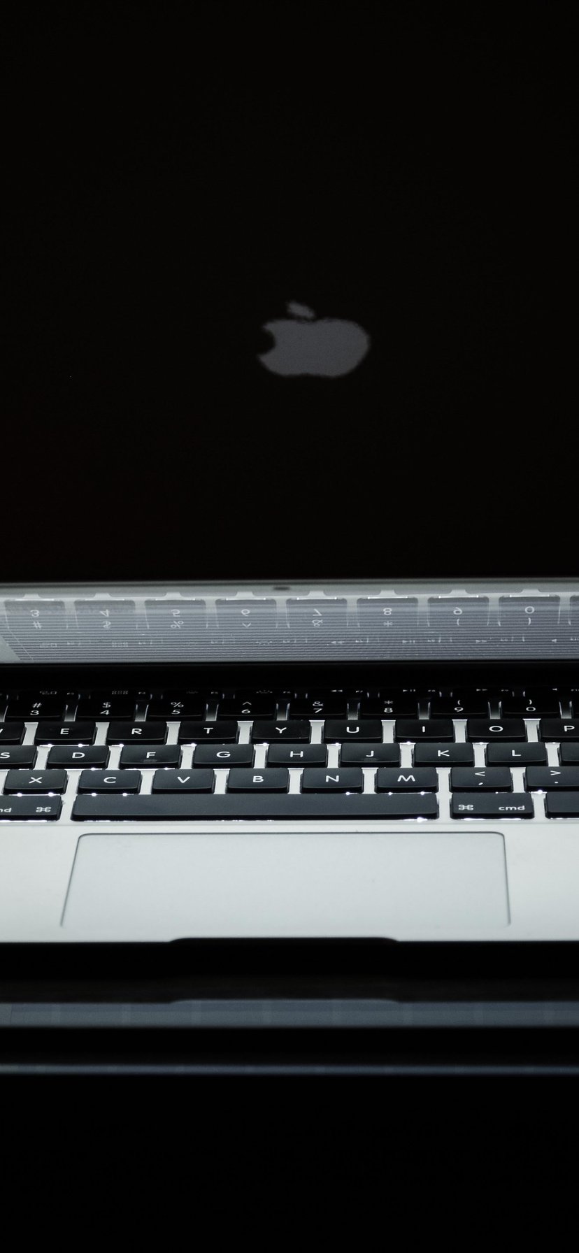 MacBook with a bright backlight - Wallpapers for iPhone 11/XR in 828x1792 resolution