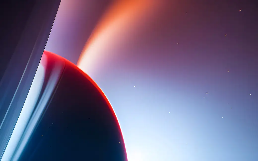 Gas giant with glowing rings in space — desktop and phone wallpaper, free download