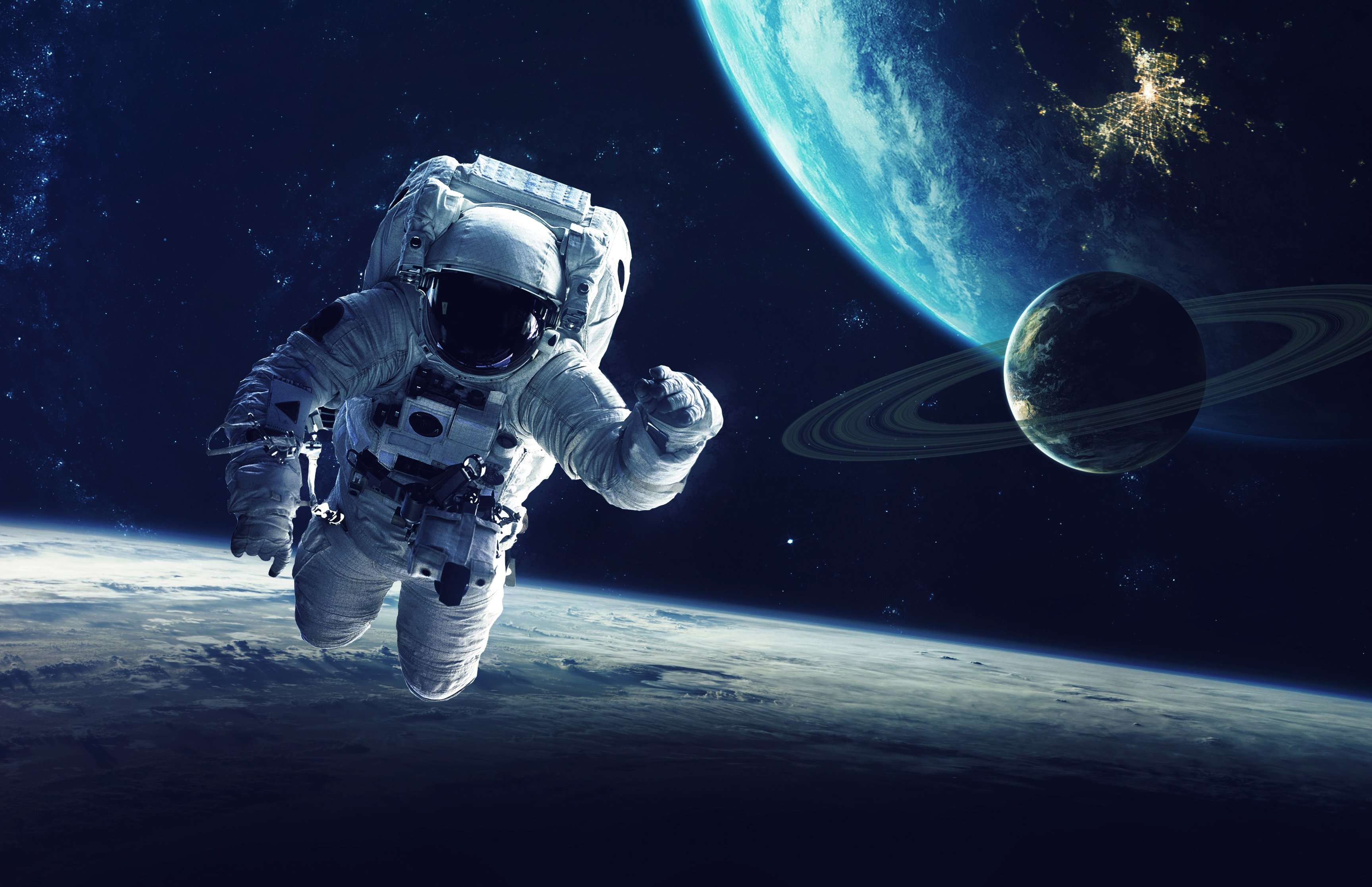 Astronaut in space in orbit - Wallpapers for Apple MacBook 16.2″ in 3456x2234 resolution