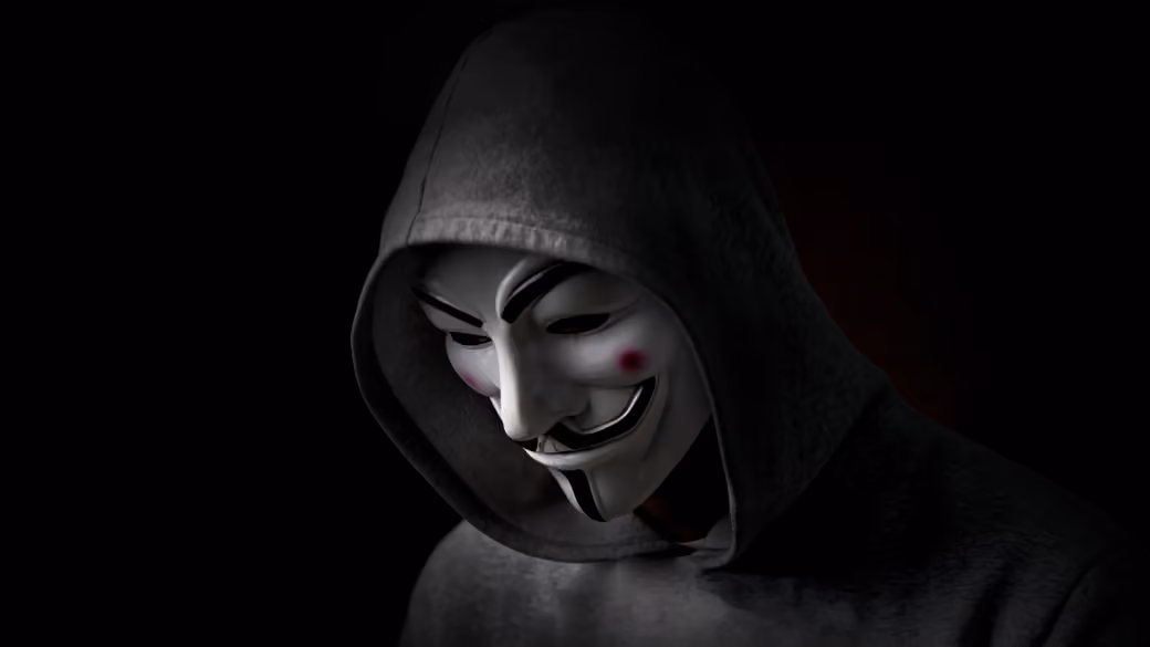 Анонимус в капюшоне и маске — обои на рабочий стол и телефон