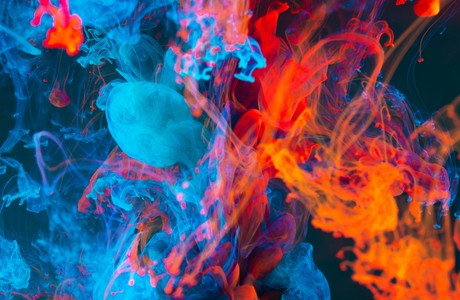 Vibrant Swirls of Colorful Ink in Water