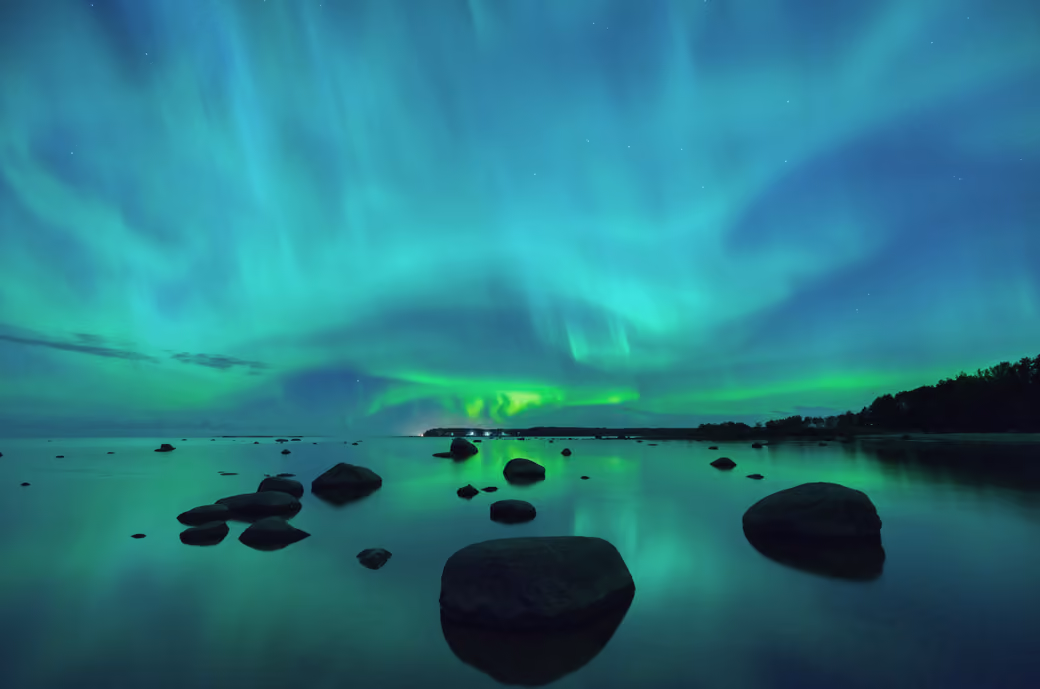 Bright turquoise Northern Lights — desktop and phone wallpaper, free download
