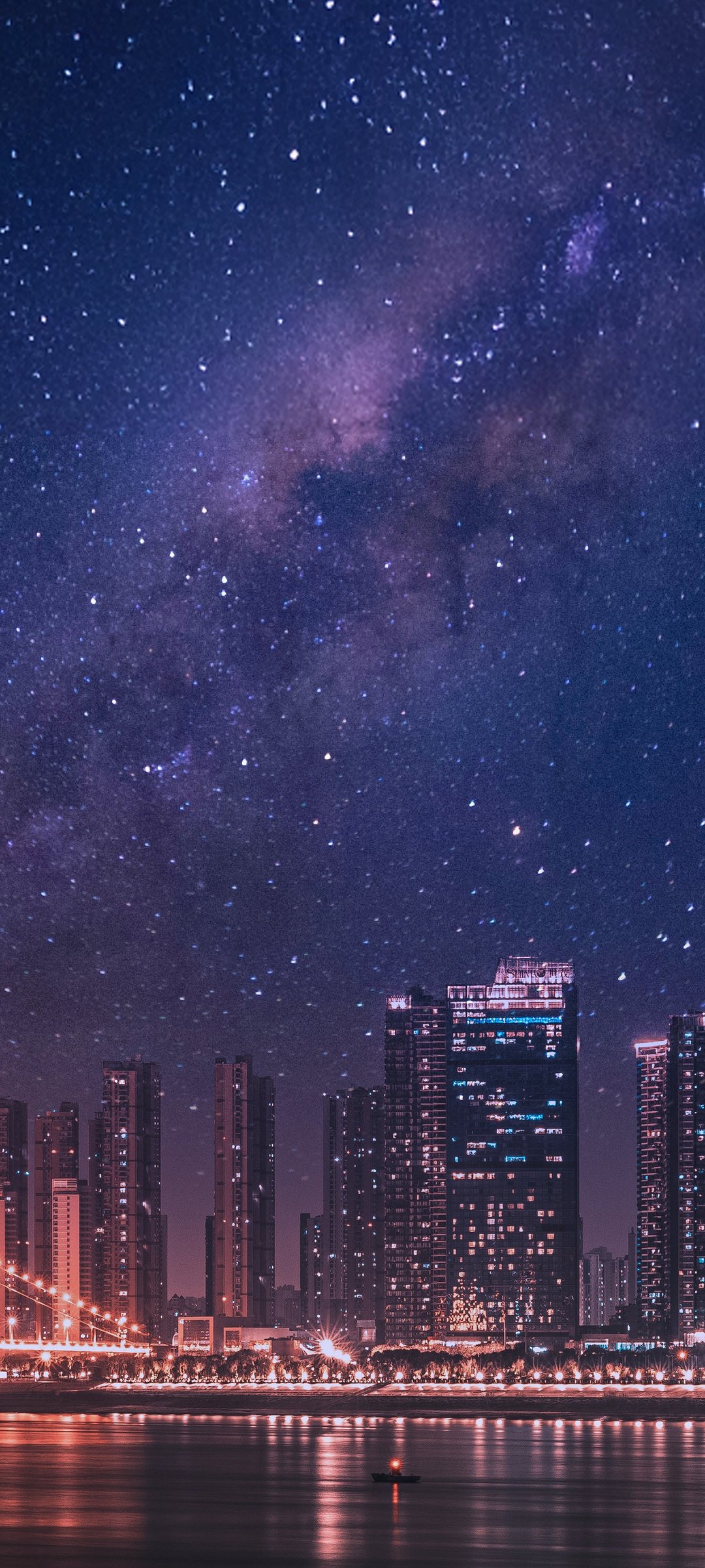 Megacity with the Milky Way in the sky - Wallpapers for Samsung Galaxy M55, POCO M4/X4/X5, Xiaomi Redmi 12/13/Note 13/Note 14/Note 14S in 1080x2400 resolution