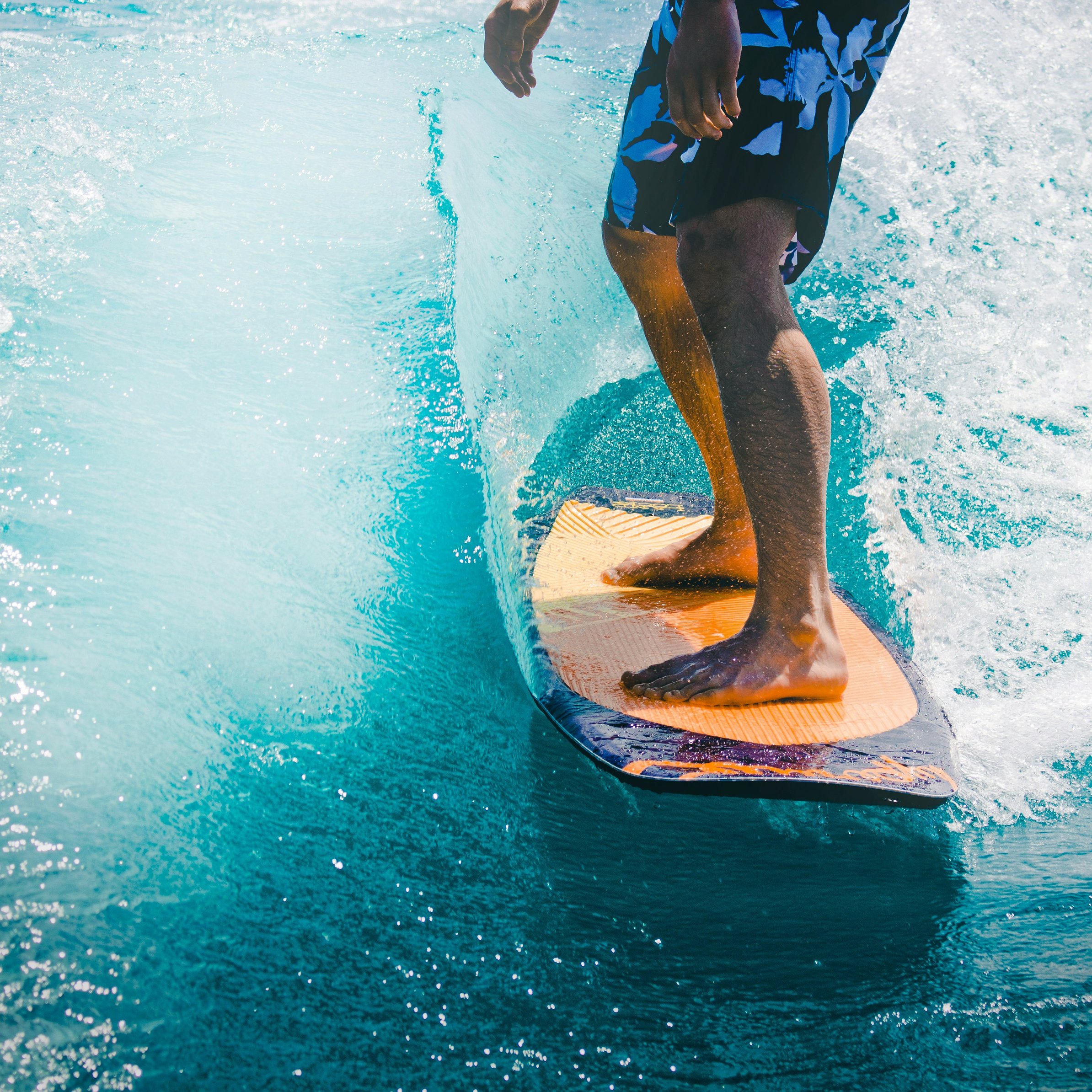 Surfer with a board on a turquoise wave - Wallpapers for iPad Pro 11″ in 2388x2388 resolution