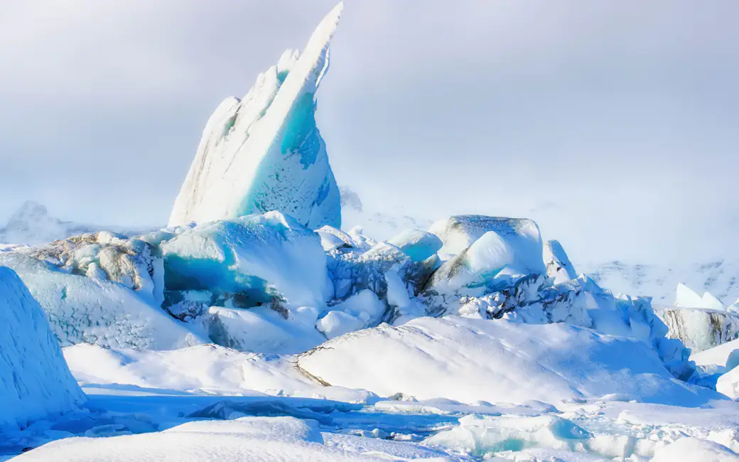 Blue-white glacier in the morning — desktop and phone wallpaper, free download