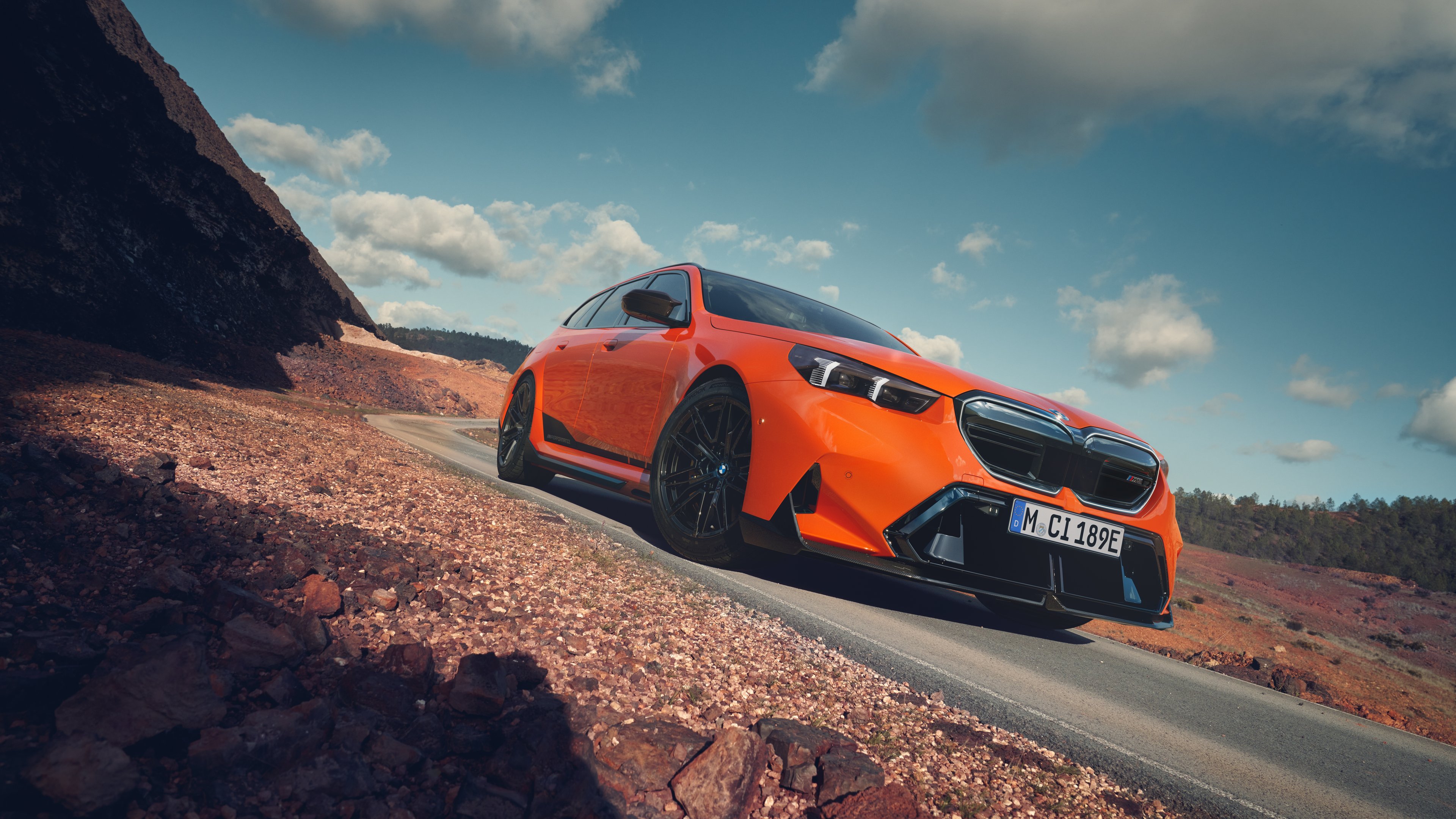Orange BMW M5 G90 Touring - 4K PC Wallpapers in 3840x2160 resolution