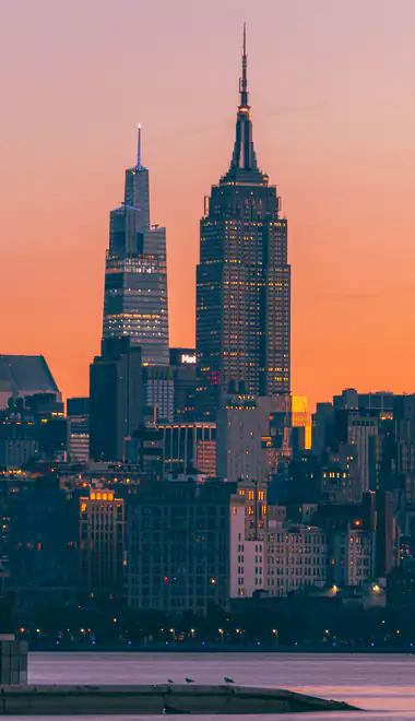 urbanization Wallpapers for iPhone 17 Pro/17/16 Pro (1206x2622): Manhattan, New York City, Empire State Building, sunset