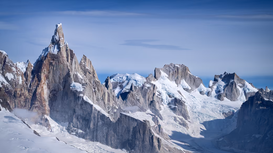 Cerro Torre Mountain with snow-capped peaks — desktop and phone wallpaper, free download