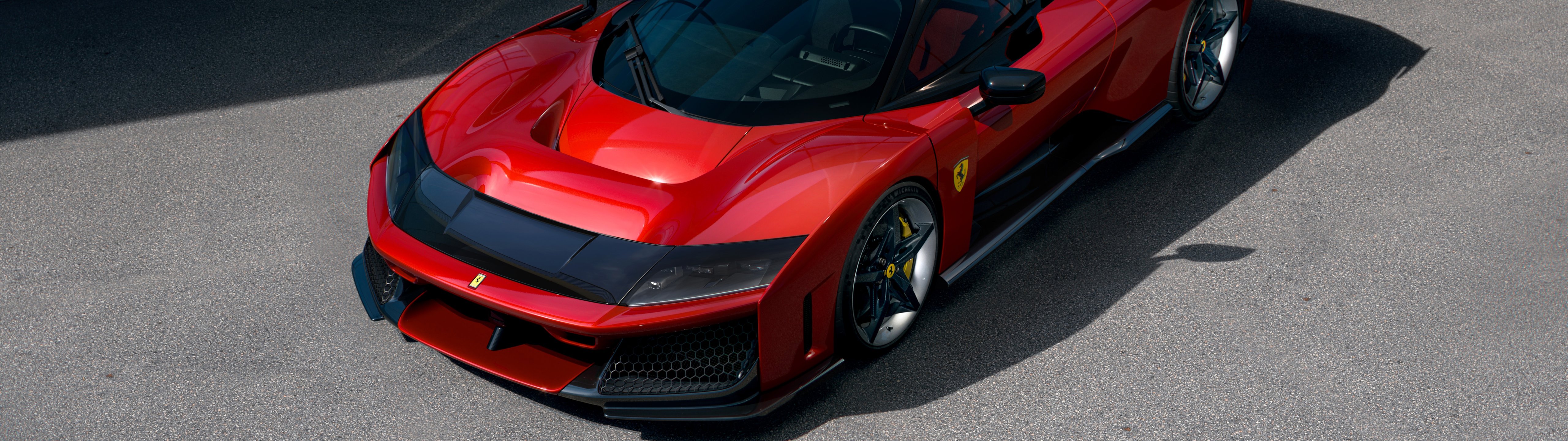 Red Ferrari F80 front view - UltraWide 32:9 wallpapers in 5120x1440 resolution