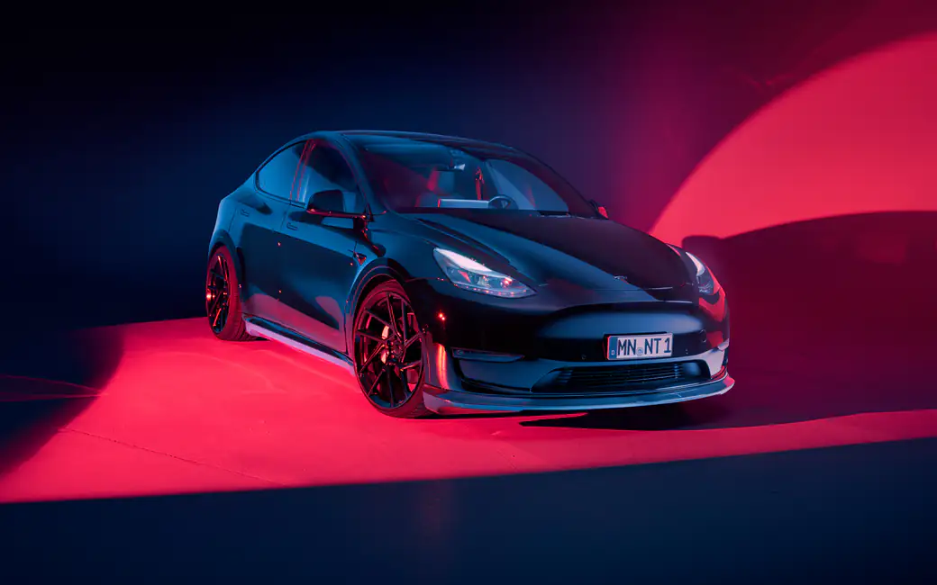 Tesla Model Y with Novitec body kit — desktop and phone wallpaper, free download