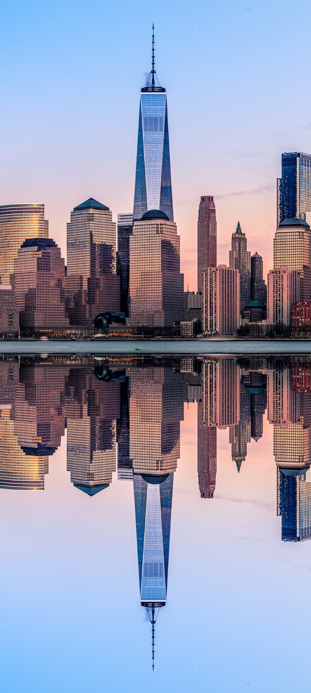 New York is reflected in the river at sunset - Wallpapers for Samsung Galaxy A13/A14/A53, Realme 12 Pro 5G, POCO M5 in 1080x2408 resolution