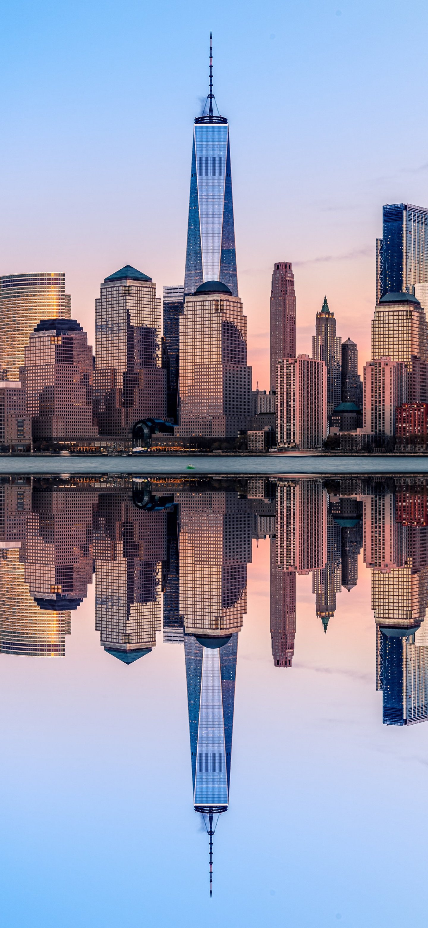 New York is reflected in the river at sunset - Wallpapers for Samsung Galaxy S24/S24 Ultra/S25 Ultra/S25+/S26 Ultra in 1440x3120 resolution