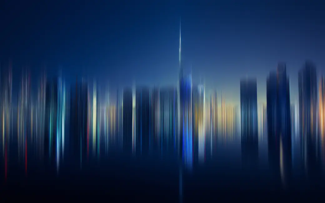 City skyscrapers with vertical blur — desktop and phone wallpaper, free download