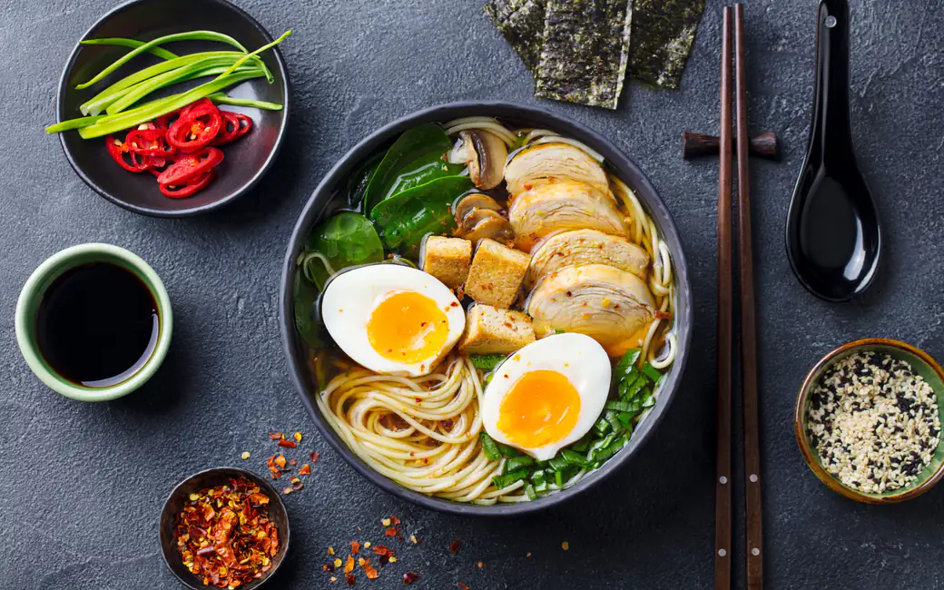 Ramen bowl with soft boiled eggs and fresh salad — desktop and phone wallpaper, free download