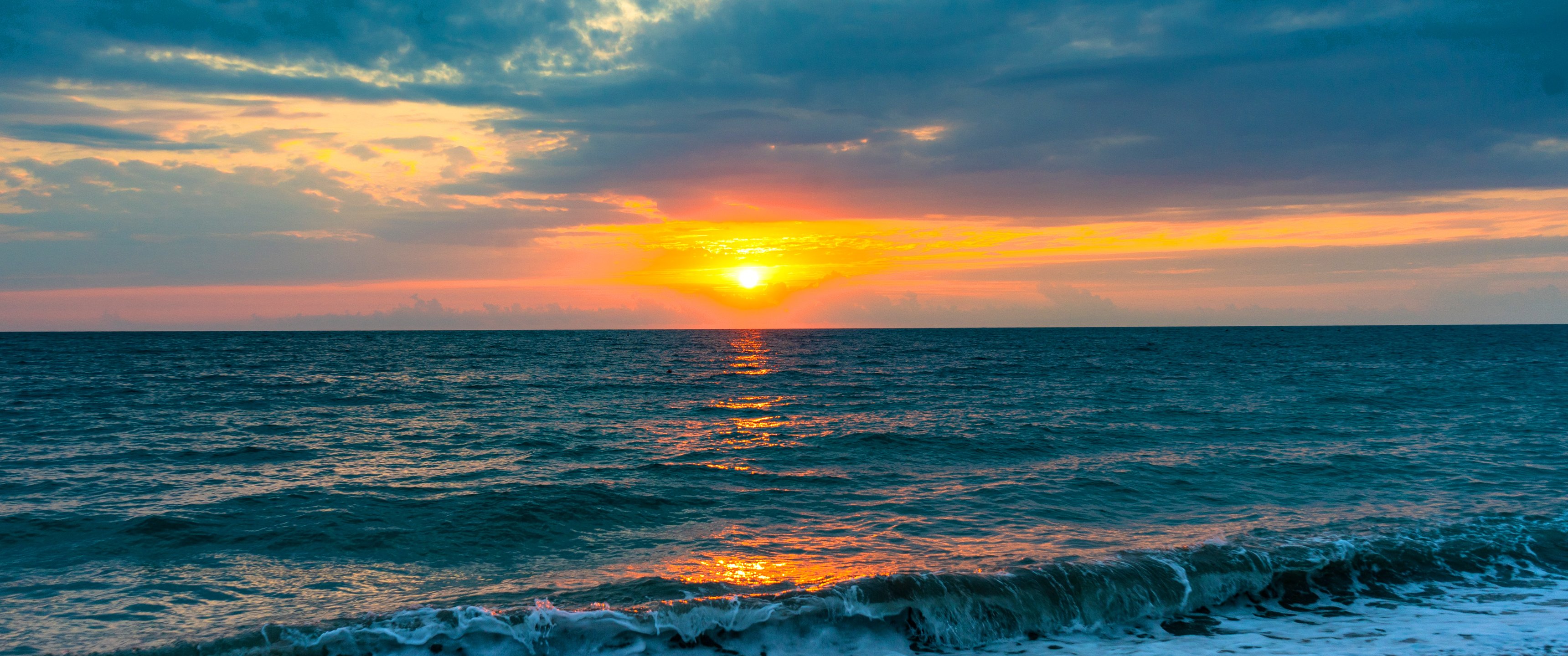 Sunset Over Rocky Sea Coast - UltraWide 21:9 wallpapers in 3440x1440 resolution