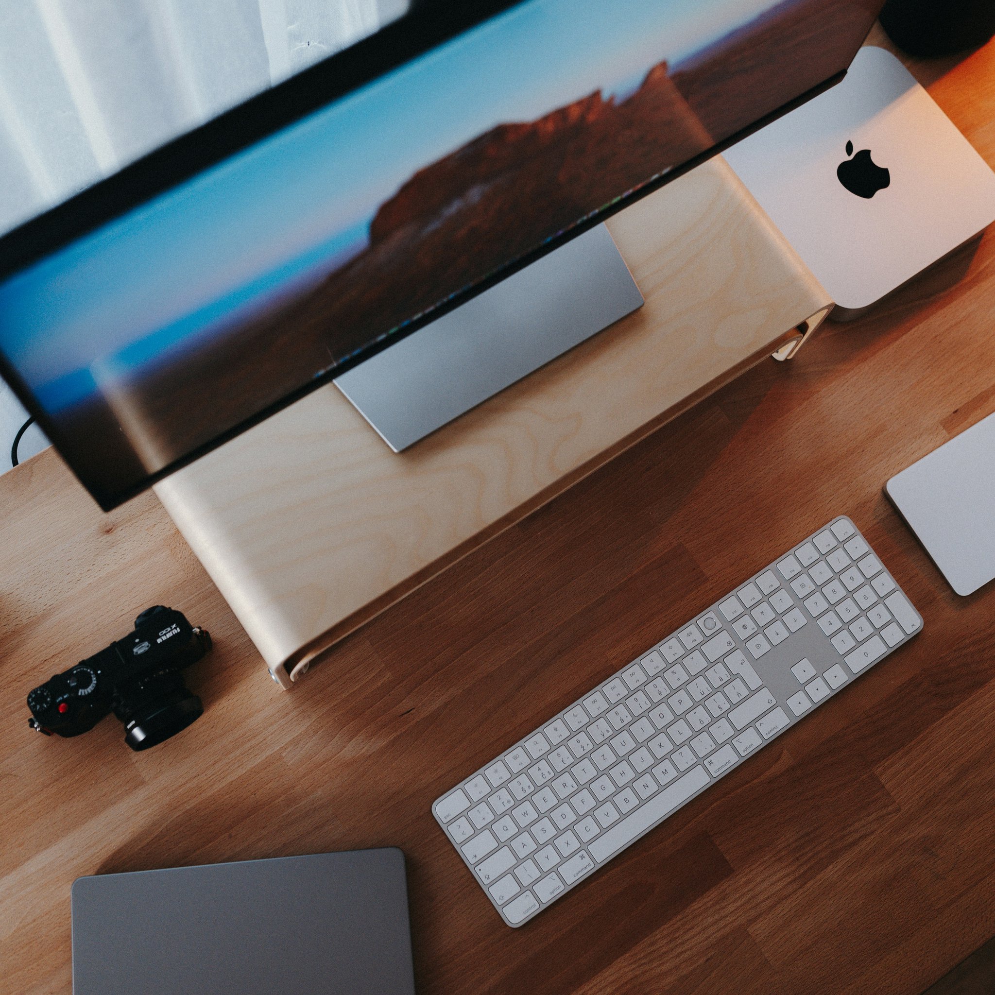 Modern workspace with Apple computer setup - Wallpapers for iPad Retina in 2048x2048 resolution