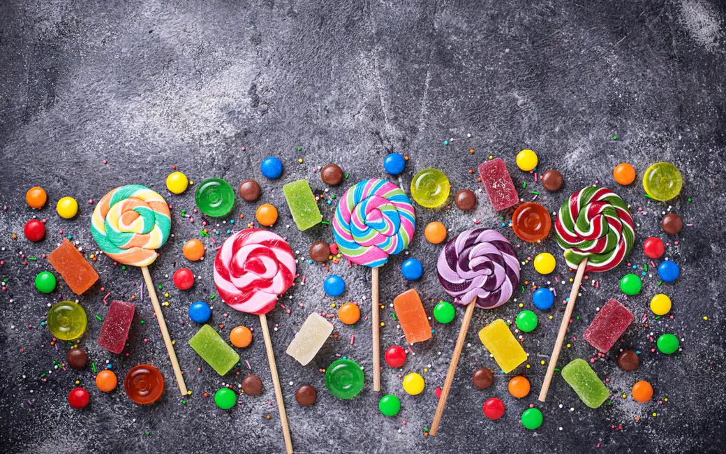 Colorful Lollipops and Candy Treats — desktop and phone wallpaper, free download