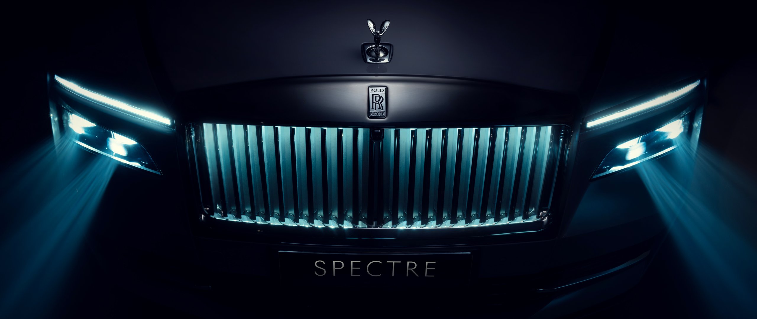 Rolls-Royce Spectre in the dark in front - UltraWide 21:9 wallpapers in 2560x1080 resolution