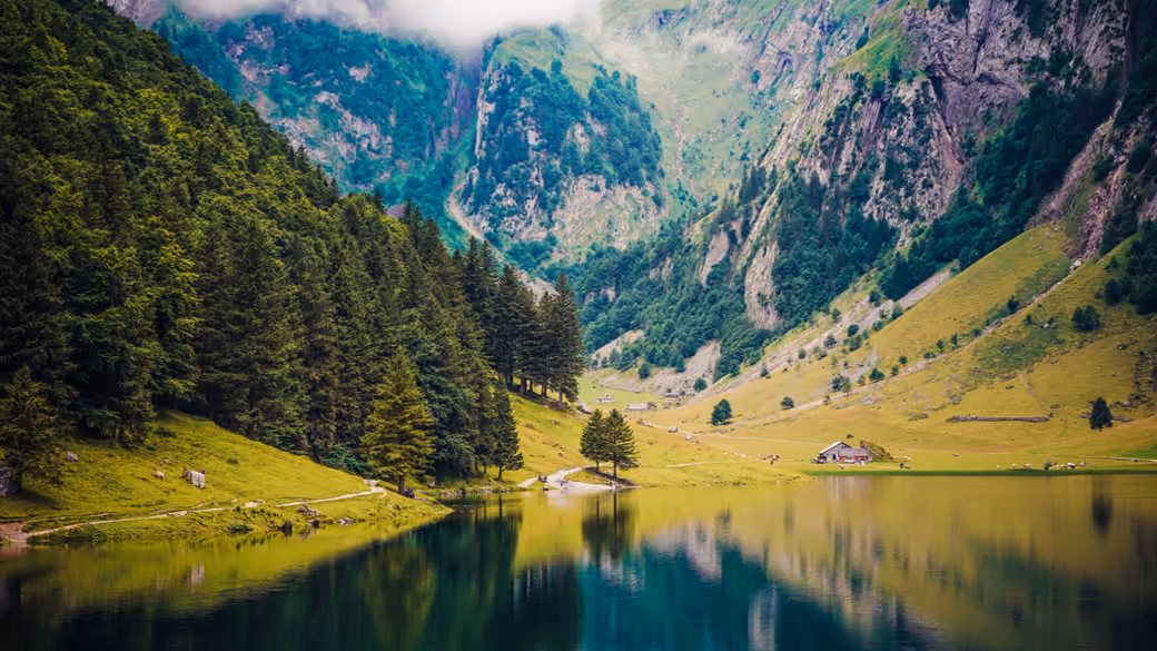 Swiss Alps Summer Lake Cabin — desktop and phone wallpaper, free download