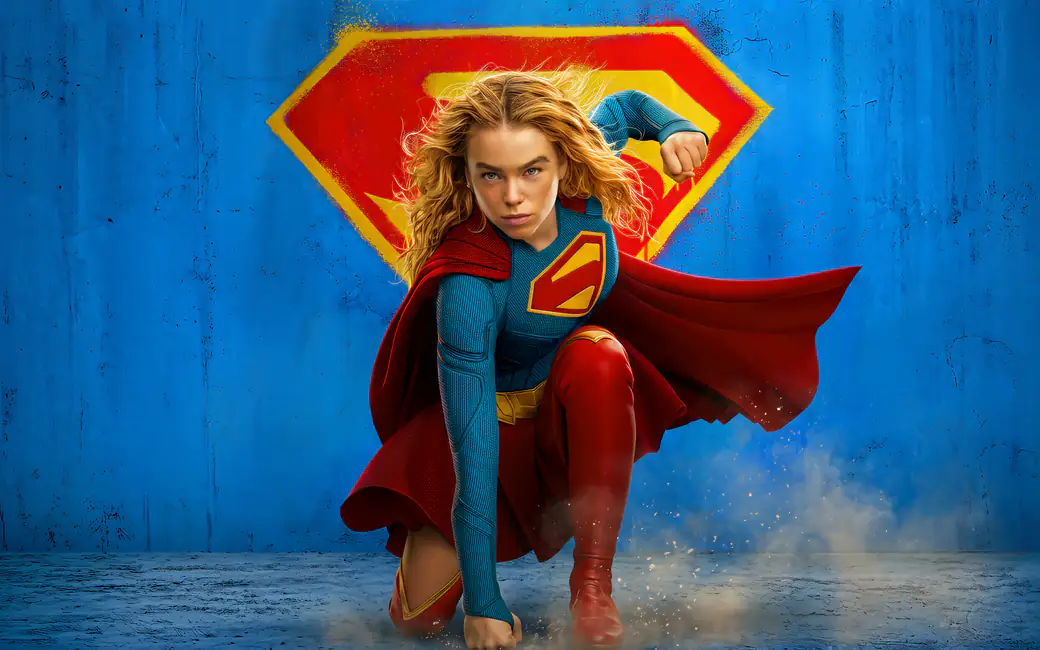 Supergirl in Red Cloak with Logo — desktop and phone wallpaper, free download