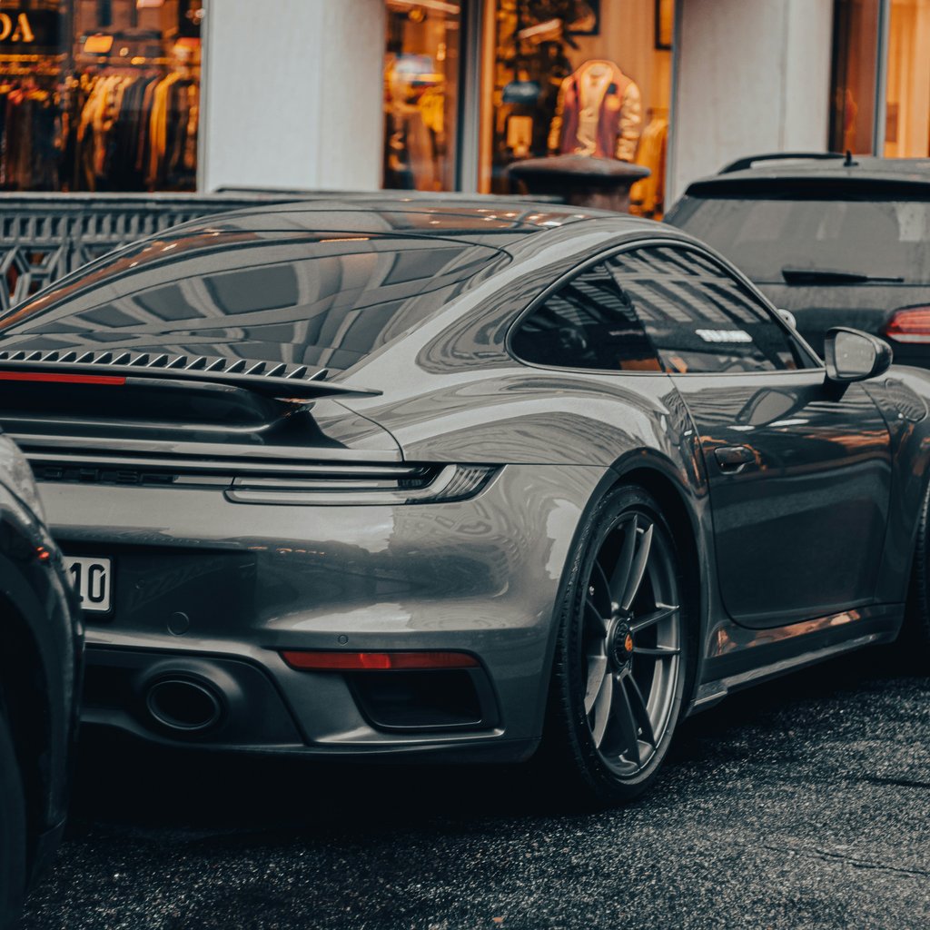 Grey Porsche 911 992 rear view - Wallpapers for Apple iPad 1 in 1024x1024 resolution