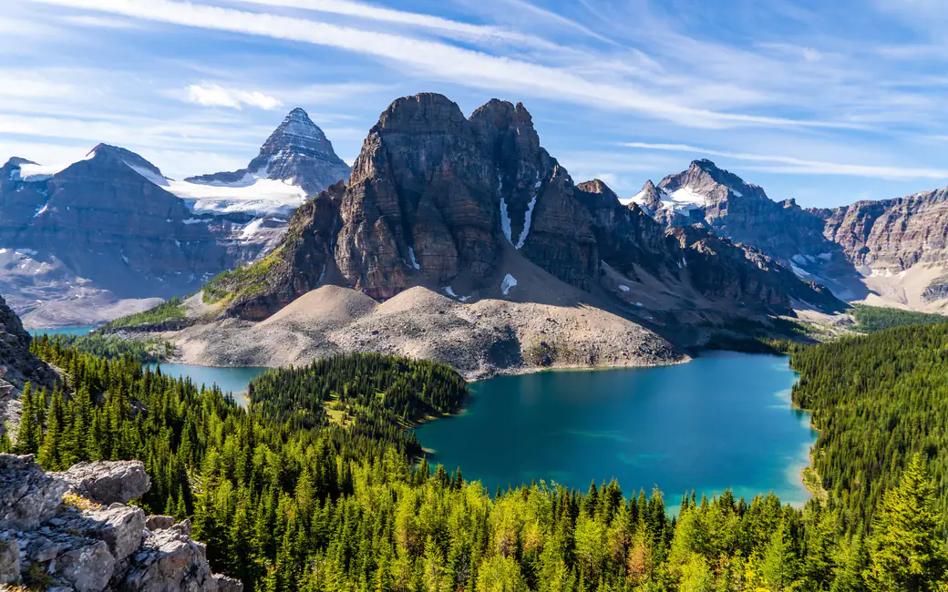 Moraine Lake nestled among Rocky Mountains — desktop and phone wallpaper, free download