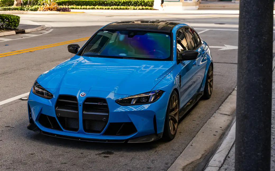 Bright Blue BMW M3 G80 with Carbon Kit — desktop and phone wallpaper, free download