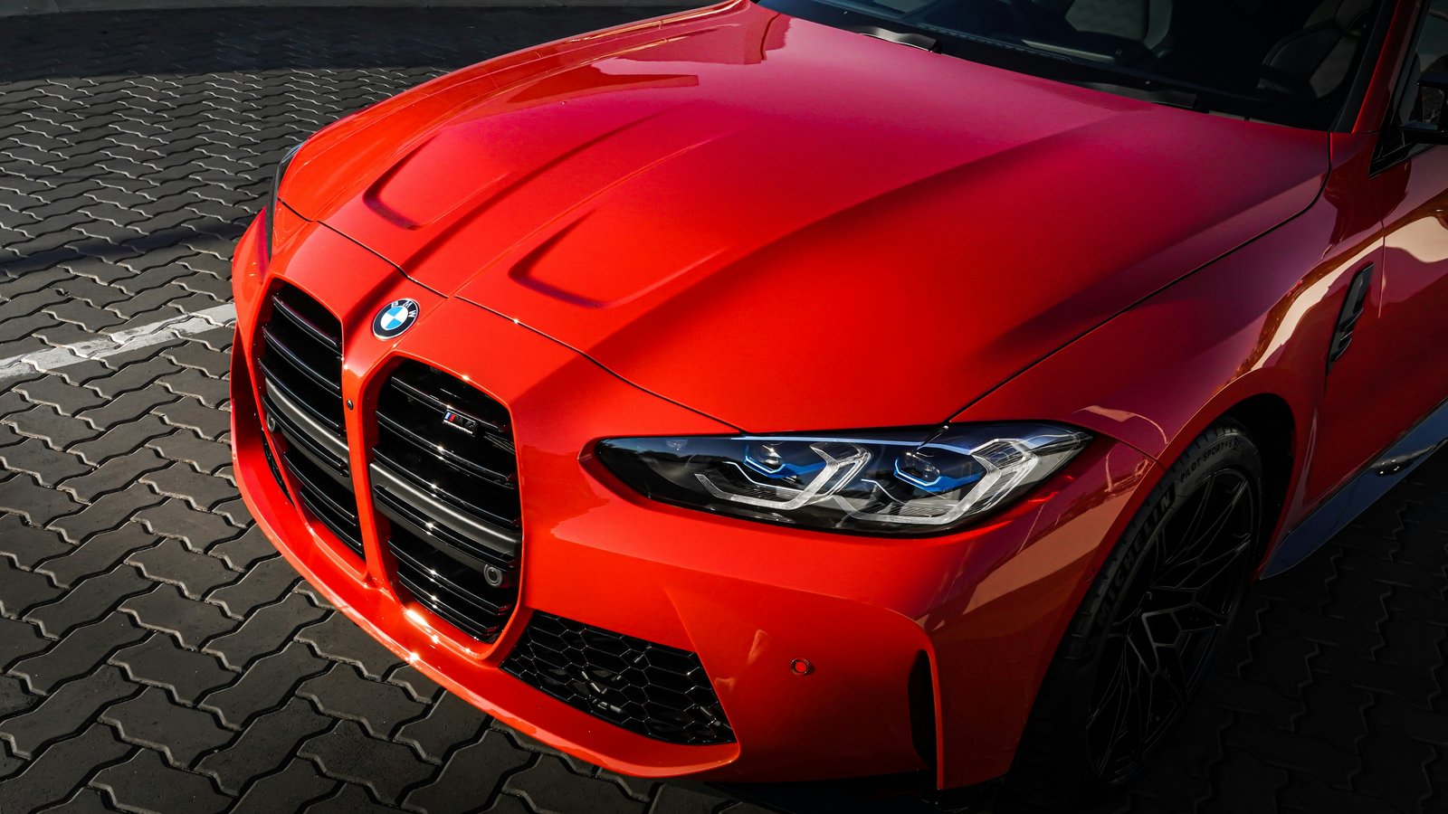 Red BMW M4 Competition Front View - wXGA++ wallpapers in 1600x900 resolution