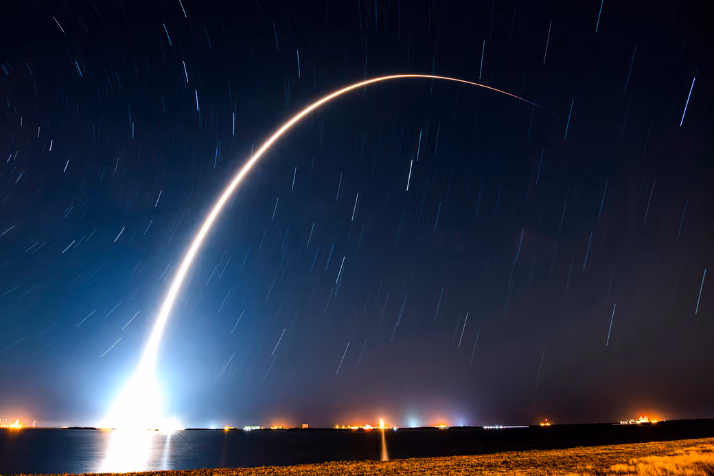 Rocket Launch with Light Trails at Night - Wallpapers for Apple MacBook Air 13 M2″ in 2560x1664 resolution